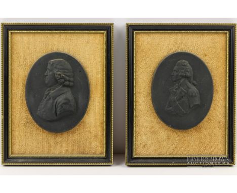 Two black basalt portrait medallions, probably Wedgwood, of Nelson and Erasmus Darwin, mounted and framed, oval, 9.2cm max. a