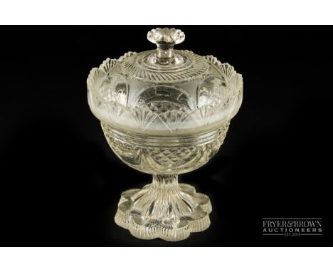 A cut glass sweetmeat footed bowl & cover, with lemon squeezer base, 19cm high