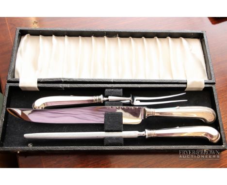 A silver plated carving set, three piece, makers mark J. Barker &amp; Dixon Ltd., Sheffield