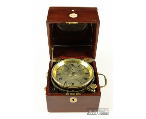 A marine chronometer, in mahogany case, c1870, signed Barrauds, London to the silvered dial and numbered 772