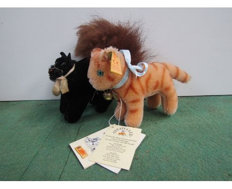 A Steiff replica Tabby 1929 cat and Steiff style cat 
