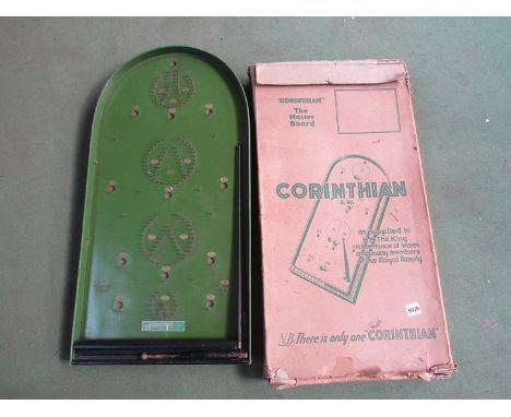 A boxed Corinthian bagatelle board with instruction and tin of ball bearings 