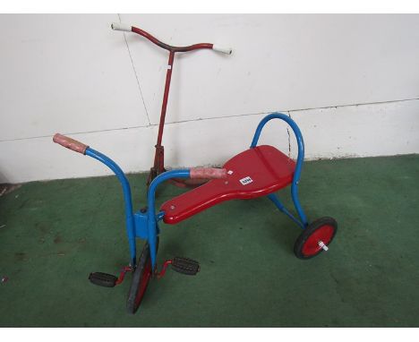 A child's scooter and tricycle 