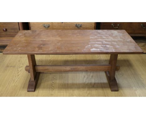 An adzed oak coffee table by Derek 'Lizardman' Slater of Crayke, North Yorkshire, 107 x 45 x 44 cm[Derek Slater was apprentic