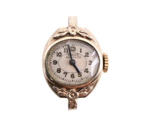 A 1920s Rolex Standard gold-plated wristlet watch, having a crown wound 17 rubies (jewel) movement, oval face, blued-steel da