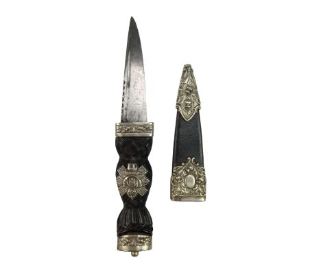 A Victorian army officer's sgian dubh, its horn grip bearing a badge of the Highland Light Infantry, the scabbard locket bear