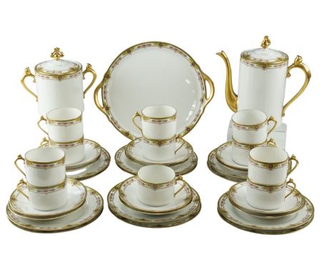 A Chabrol and Poirier Limoges porcelain coffee set, pattern number 428, comprising a pot and sucrier with cans, saucers and s