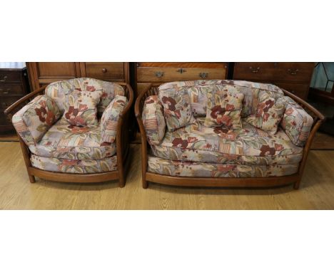 A contemporary Ercol 'New Renaissance' sofa and armchair, 75 cm high