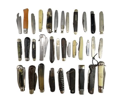 A quantity of vintage folding pocket knives, including three advertising / promotional