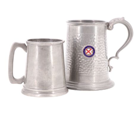 A pewter tankard bearing applied enamel badge for 'S.S Uganda' and a smaller tankard, former 13 cm high [The SS Uganda was a 