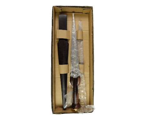 A reproduction Scottish dirk, of late 17th Century form, having a brass-mounted hardwood grip and leather scabbard, 51 cm, in