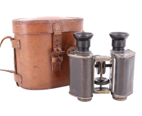 A set of late 19th / early 20th Century Goertz binocular field glasses, the instrument case inscribed Major Pennington, IXth 
