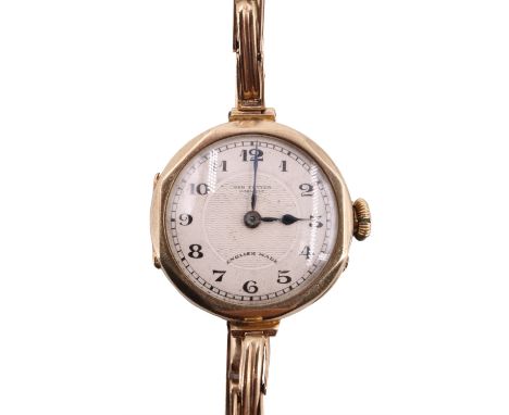 A 1920s lady's George Potter of Carlisle 9 ct gold wristlet watch, having a crown-wound pin-set movement with circular painte