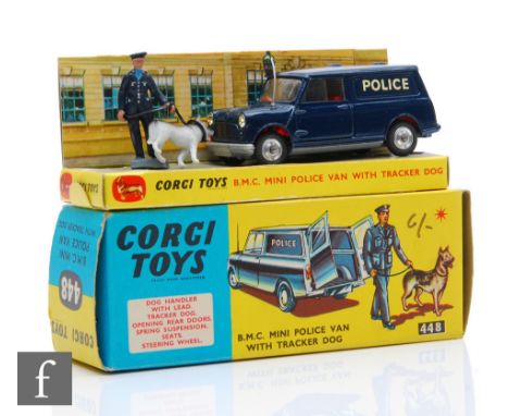 A Corgi 448 BMC Mini Police Van with Tracker Dog, in dark blue with red interior with policeman and dog, with inner pictorial
