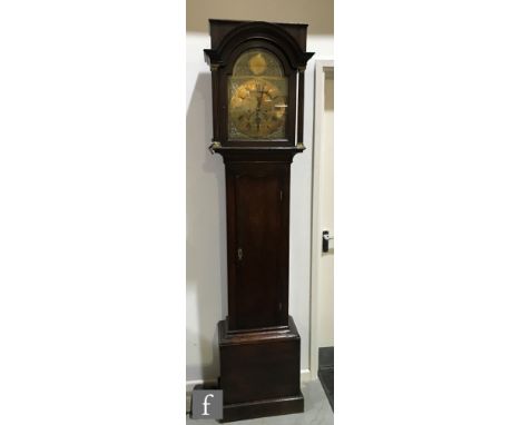 A 19th Century and later oak longcase clock, the later associated eight-day movement with 12 inch arch brass dial with subsid