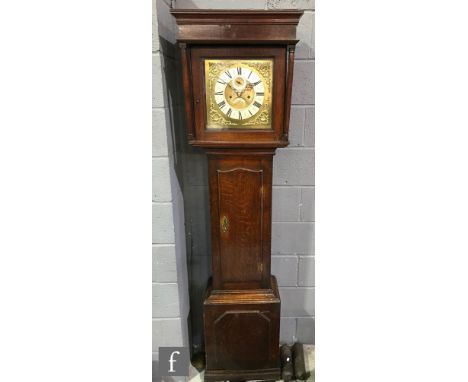 A 19th Century oak longcase clock with later associated eight-day movement striking on a bell, the 12 inch square brass dial 