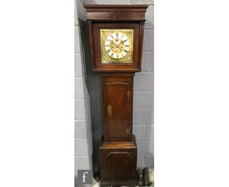 A 19th Century oak longcase clock with later associated eight-day movement striking on a bell, the 12 inch square brass dial 