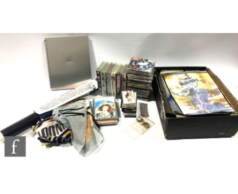 Madonna - A collector's archive, to include thirty various CDs (singles and albums), cassettes, VHS, DVDs, wall banner, scarf