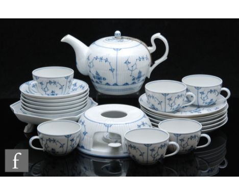 A 20th Century Wallendorf porcelain teaset comprising teapot, burner with tealight holder, six teacups and saucers, six side 