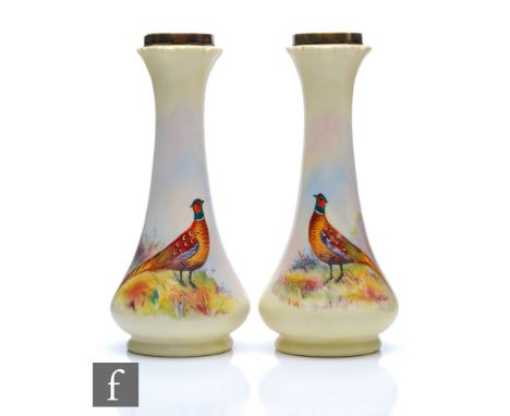 A pair of early 20th Century Locke &amp; Co Worcester spill vases each decorated with a hand painted pheasant by W Stinton, b