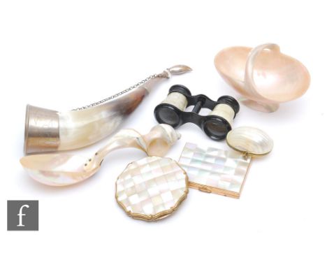 Two mother of pearl powder compacts, a worked shell sweet meat basket, a spoon, horn etc. (qty) 