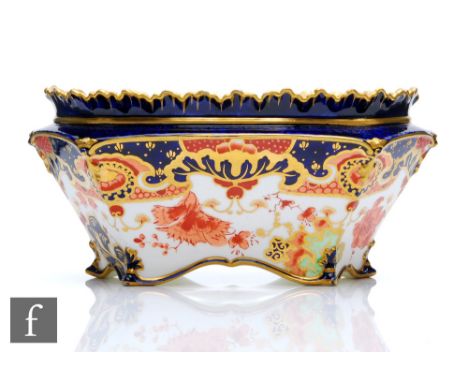 A Royal Crown Derby oval planter decorated with an Imari pattern, printed mark with date cypher for 1900, length 18cm. 