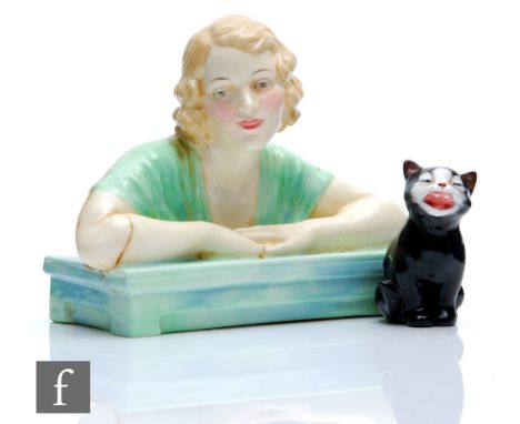 A 1930s Royal Doulton Art Deco bust titled Gladys HN1740, printed mark, length 17cm, together with a Royal Doulton black cat 