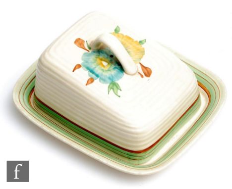 A Clarice Cliff Lynton shape cheese dish and cover circa 1936, hand painted with flower heads with green and brown banding, A