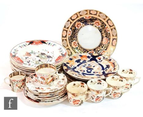 Five 19th Century Davenport Stone China 25cm dinner plates decorated in an Imari pattern with Chinoiserie floral decoration, 