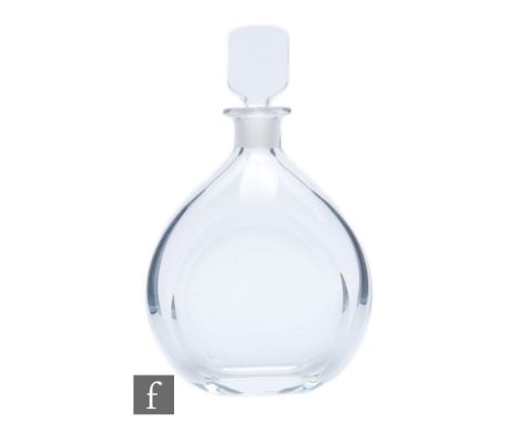 A 20th Century Orrefors clear crystal glass decanter of shouldered ovoid form with slice cut body below a facet stopper, engr
