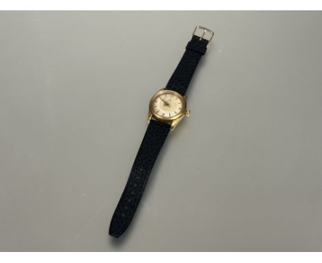 A Vintage Tudor Oyster wristwatch with gilt metal case, stainless steel back and enamel dial with seconds hand and original w