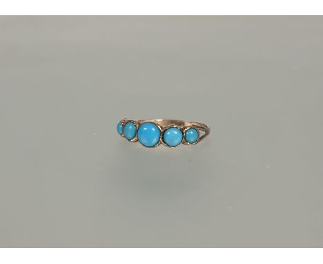 A 9ct gold ring set five turquoise cabochons O 1.22g