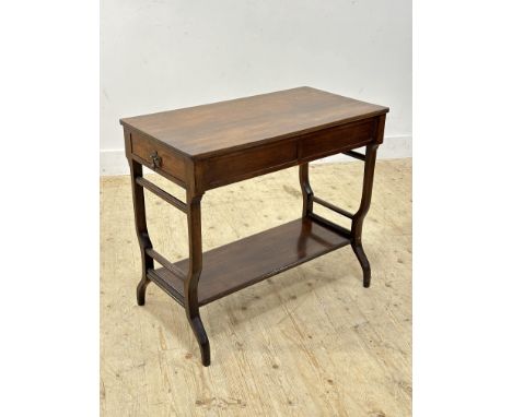 An Edwardian walnut sofa end table, with drawer to each end, with original brass handles, on shaped end supports (h.68cm x l.