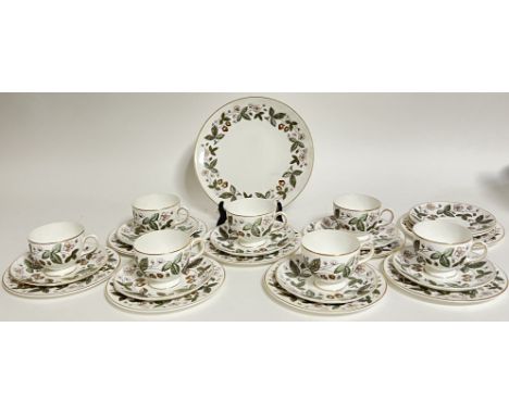 A Wedgwood 'Strawberry Hill' part tea service comprising seven cups, nine saucers, eight tea plates (for trios), a small plat