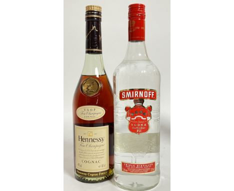 A 1litre bottle of Smirnoff triple distilled vodka (37.5%) together with a 60cl bottle of Hennessy Fine Champagne Cognac (40%