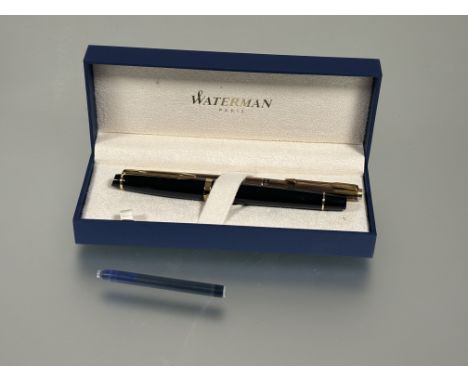 A French Waterman Expert 3 GT fountain pen in black with case and box and a Parker gilt metal slimline fountain pen (2)&nbsp;