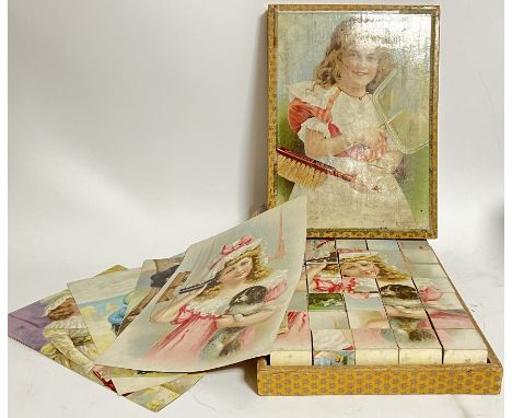 Vintage toys, a boxed set of block puzzles with various associated images/sheets of young girl/puppy/children playing etc...(