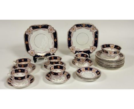 A Court China Diamond pattern part tea service comprising, two serving plates (w- 21.5cm), a sugar bowl, five tea cups, eight