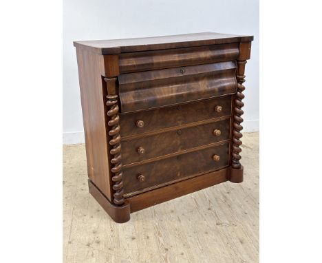 A Victorian mahogany Scotch column chest with cushion front, with original turned wood handles with mother of pearl inlay (h.