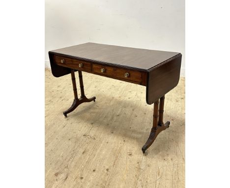 A 19thc mahogany satinwood and rosewood crossbanded sofa table fitted two frieze drawers and dummy drawers verso all with ori