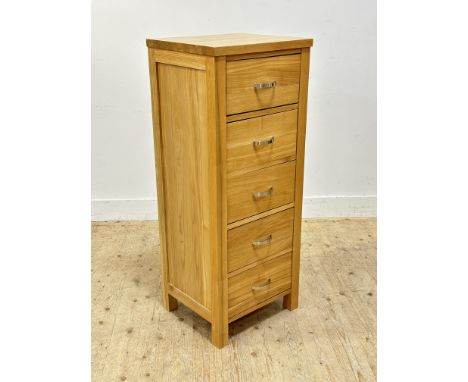 A light oak tall chest of drawers with brushed steel handles (h.118cm x l. 48cm x w.41cm)
