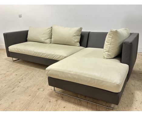 A very stylish&nbsp;Designer's Guild&nbsp;two section L shaped dark grey and light tone soft grained leather sofa, with feath