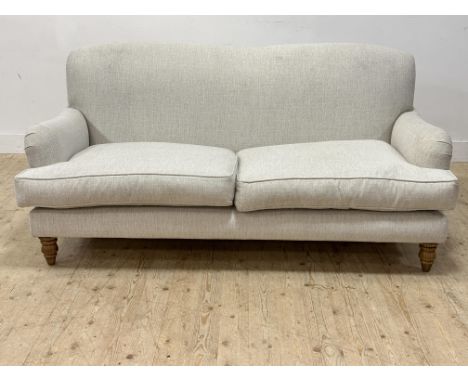 A Sofa modern two seat sofa upholstered in off white/cream textured fabric with four additional block printed cushions (h.97c
