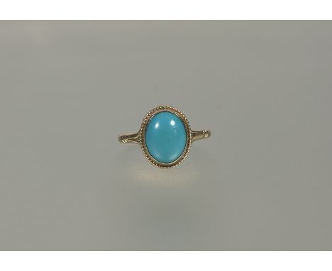 A 9ct gold ring set an oval turquoise O 1.62g&nbsp;
