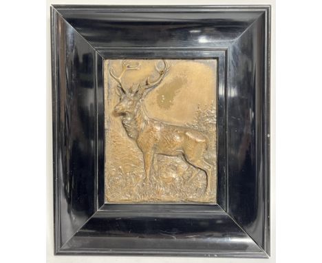 Fritz Diller&nbsp;(German 1875-1945), a cast brass or bronze relief plaque of a stag, mounted in an ebonised frame (inc. fram