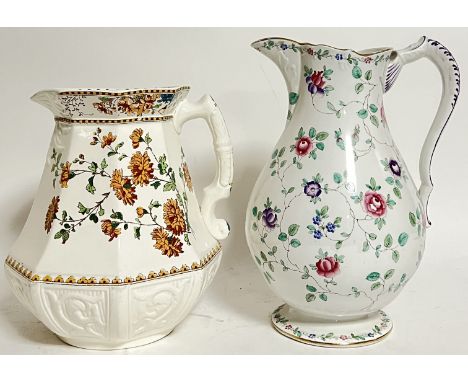 A large Booths floral decorated jug/pitcher (marked verso, h- 32cm, w- 21cm), together with another jug decorated with flower