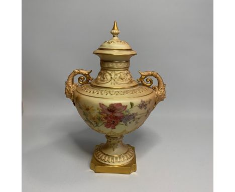 A Fine Royal Worcester Vase and Cover, Twin handled with mask heads, Painted with flowers and moulded gilt embellishment on a