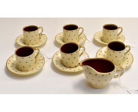 A Susie Cooper Coffee set, pattern number 1689. Six cups, six saucers, sugar bowl and a milk jug. A/F