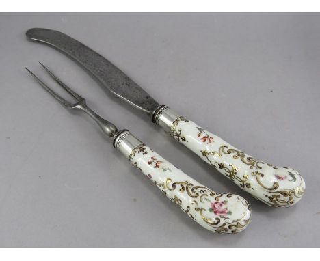 Two late eighteenth century porcelain, hand-painted pistol grip cutlery items to include a knife and fork, c. 1780. Each is m