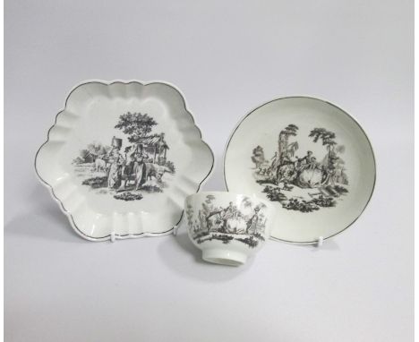 A Worcester Tea Bowl and Saucer printed with the La Amour pattern along with a Tea pot stand  printed with the milkmaids patt
